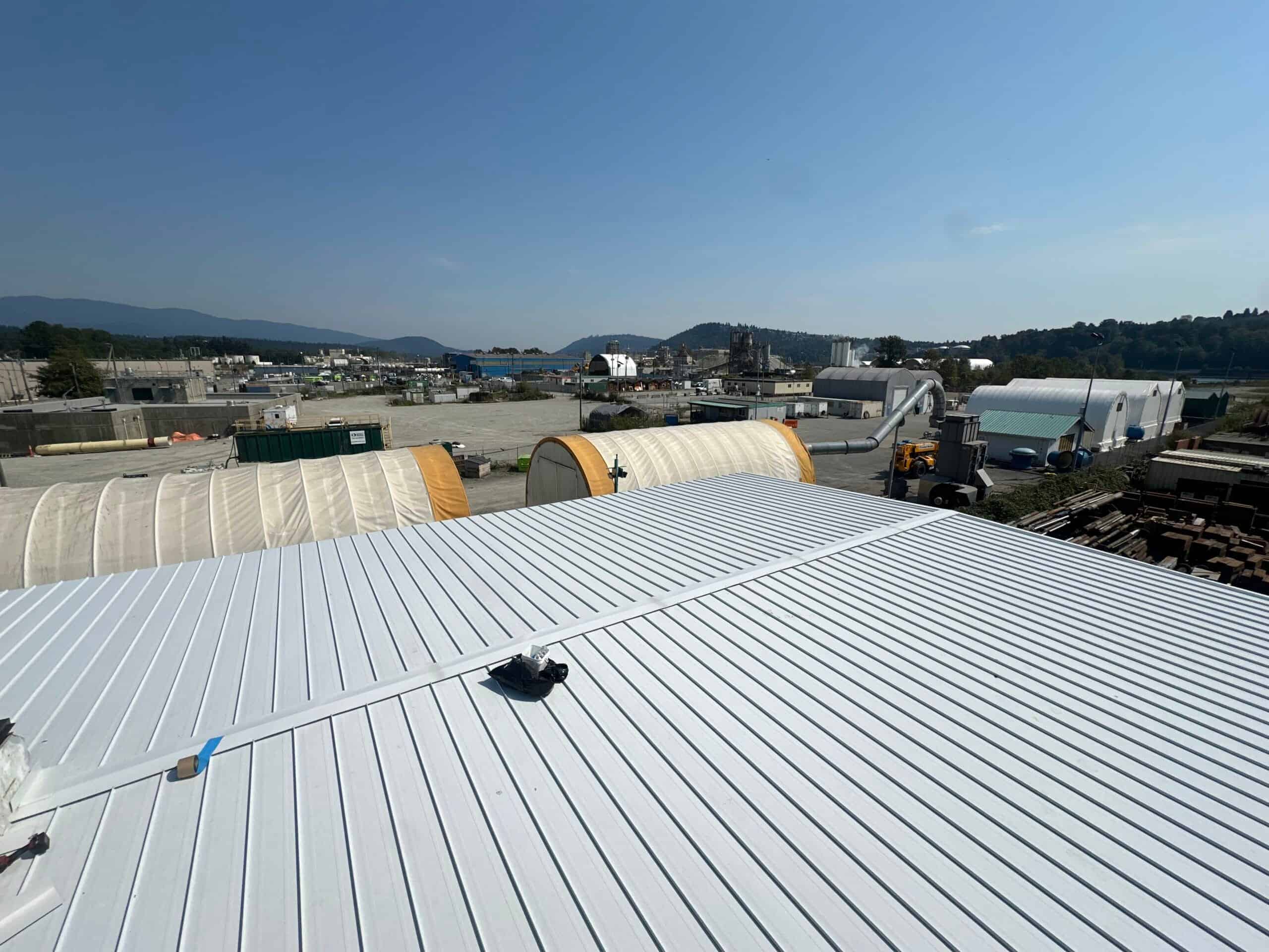 Metal roofing installation on commercial building in Vancouver BC