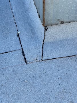 Flat Roof Repair Vancouver | Leak Detection & Repair Flat roof repair Vancouver showing leak detail and membrane failure near flashing